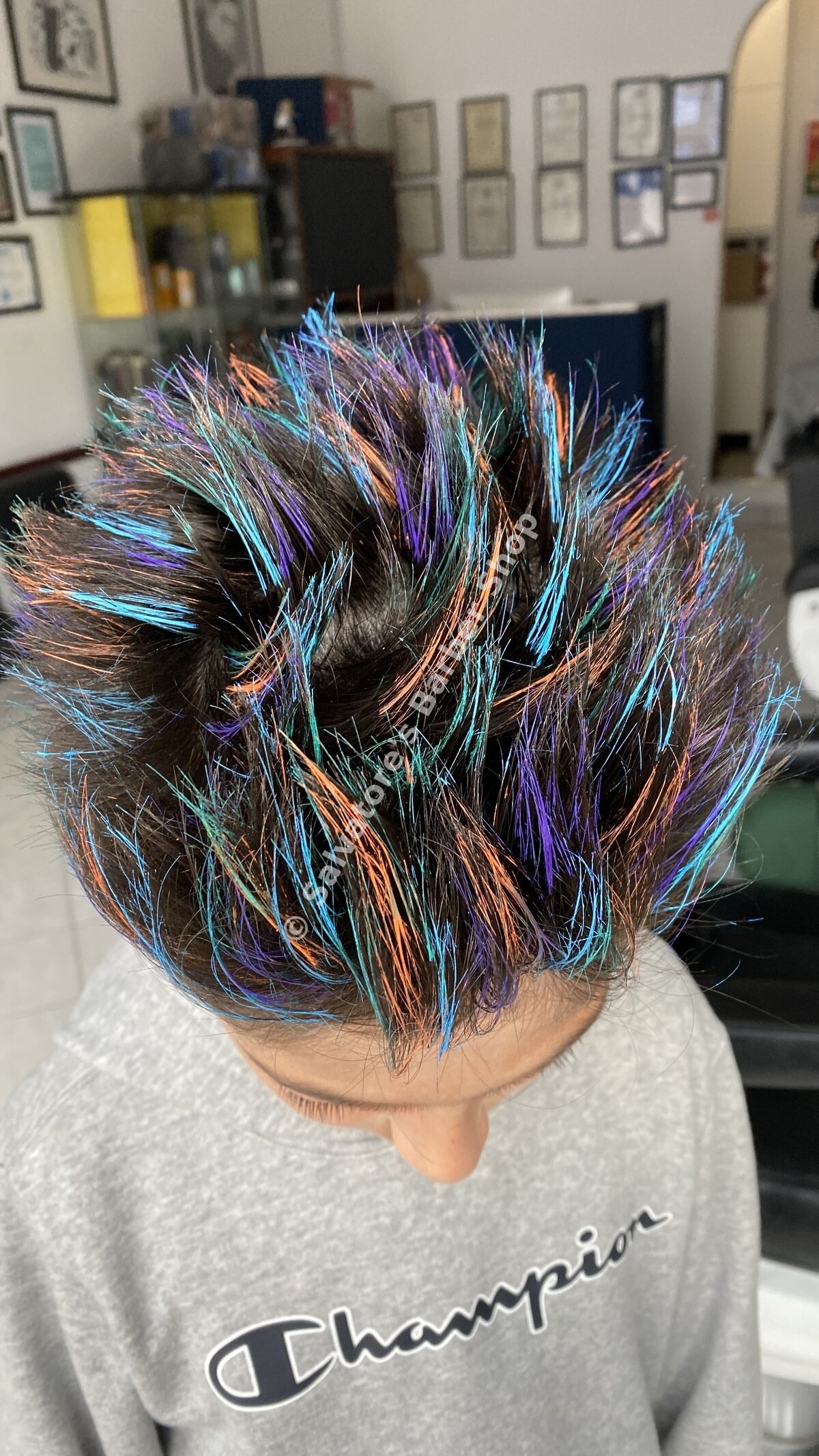 Multicoloured tinsel hair colour by Salvatore's Barber Shop Bristol