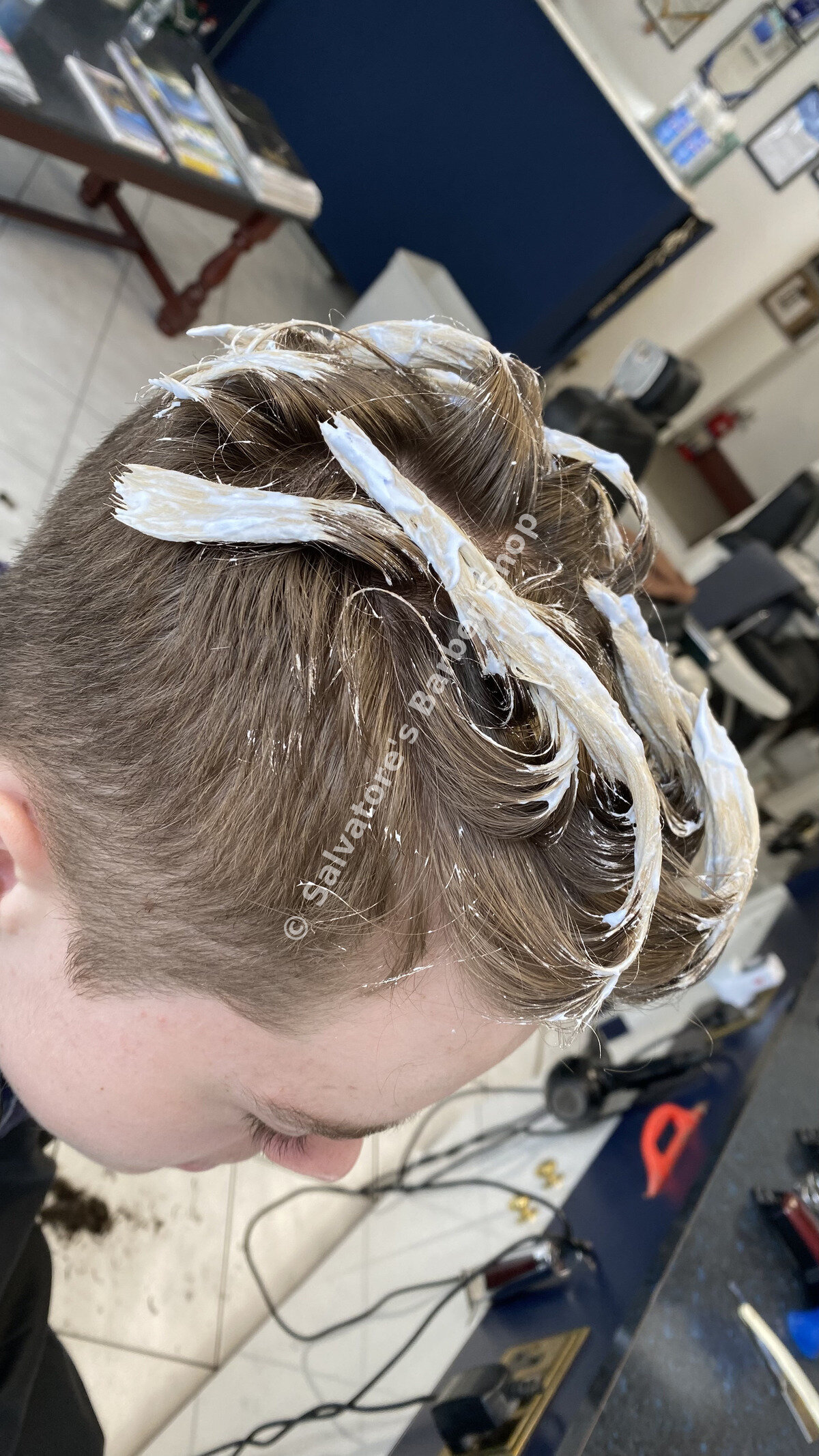 Hair colour foils being applied by Salvatore's Barber Shop Bristol