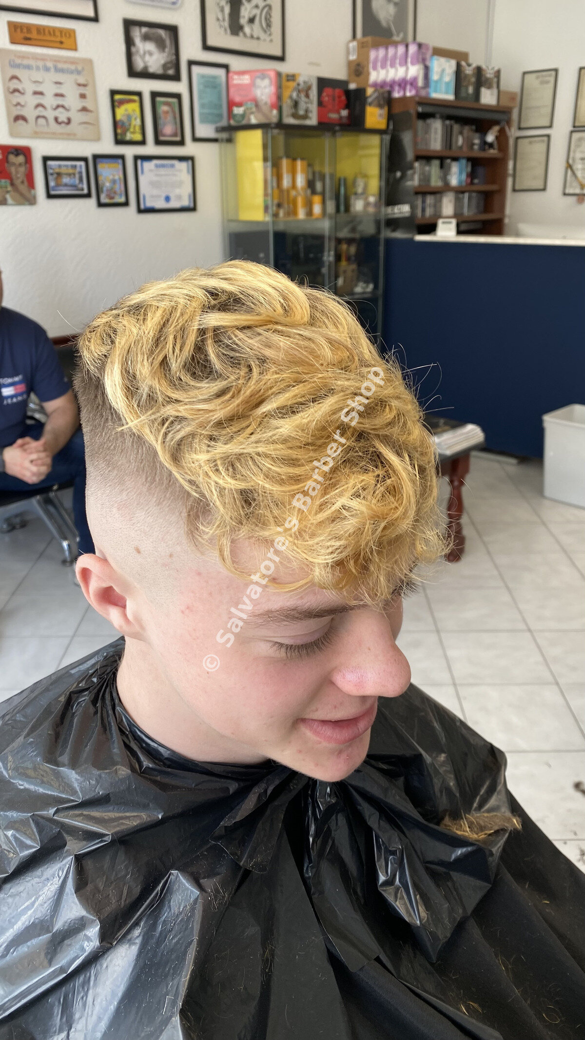 Blonde hair colour with skin fade by Salvatore's Barber Shop Bristol