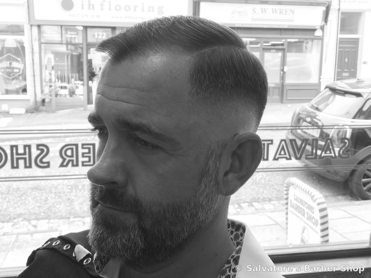 Skin fade with side part by Salvatore's Barber Shop Bristol