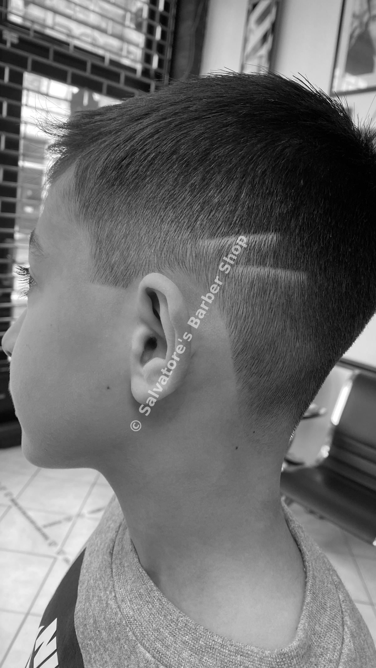 Children's haircut with hair design by Salvatore's Barber Shop Bristol