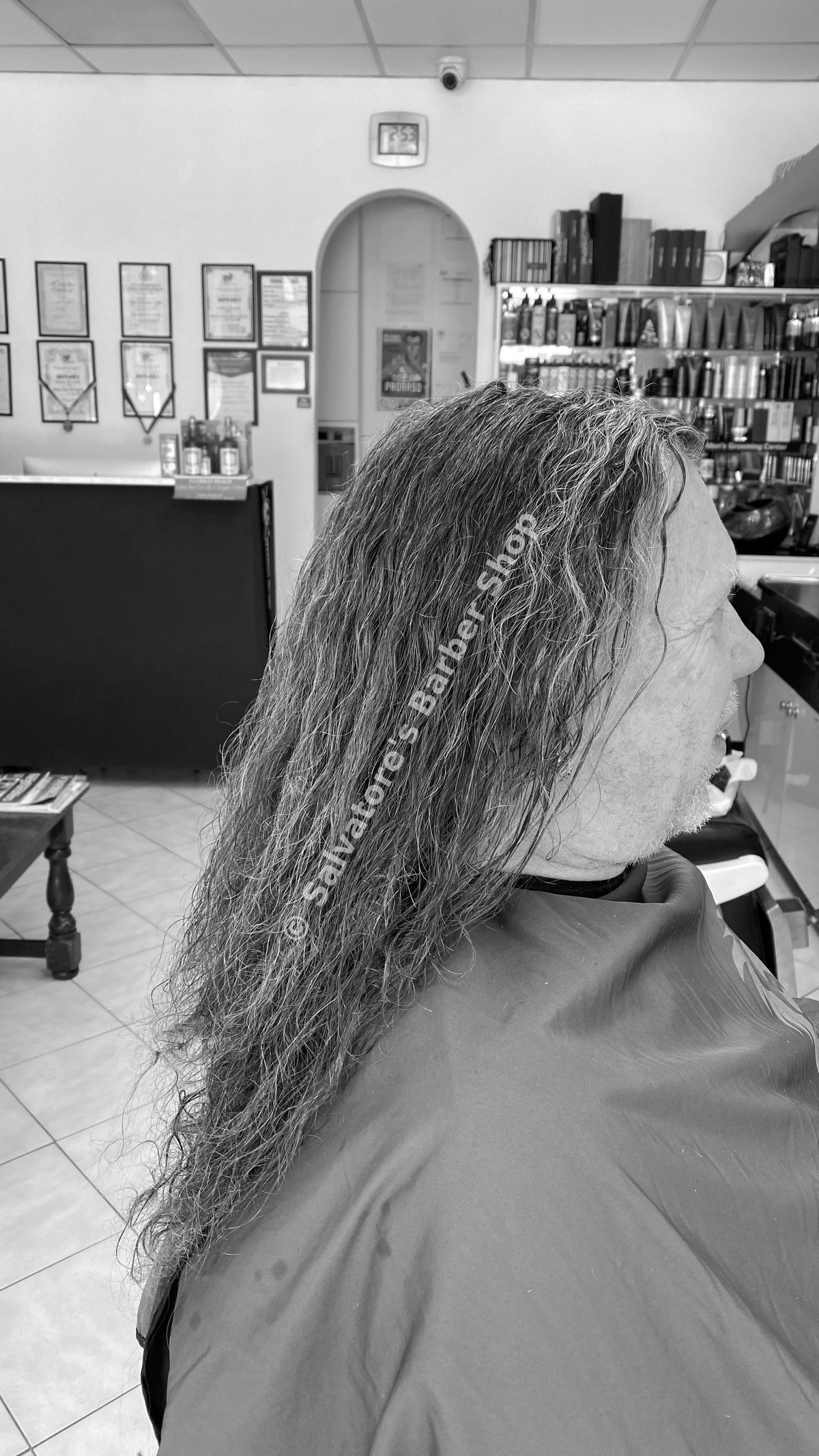 Long hairstyle by Salvatore's Barber Shop Bristol