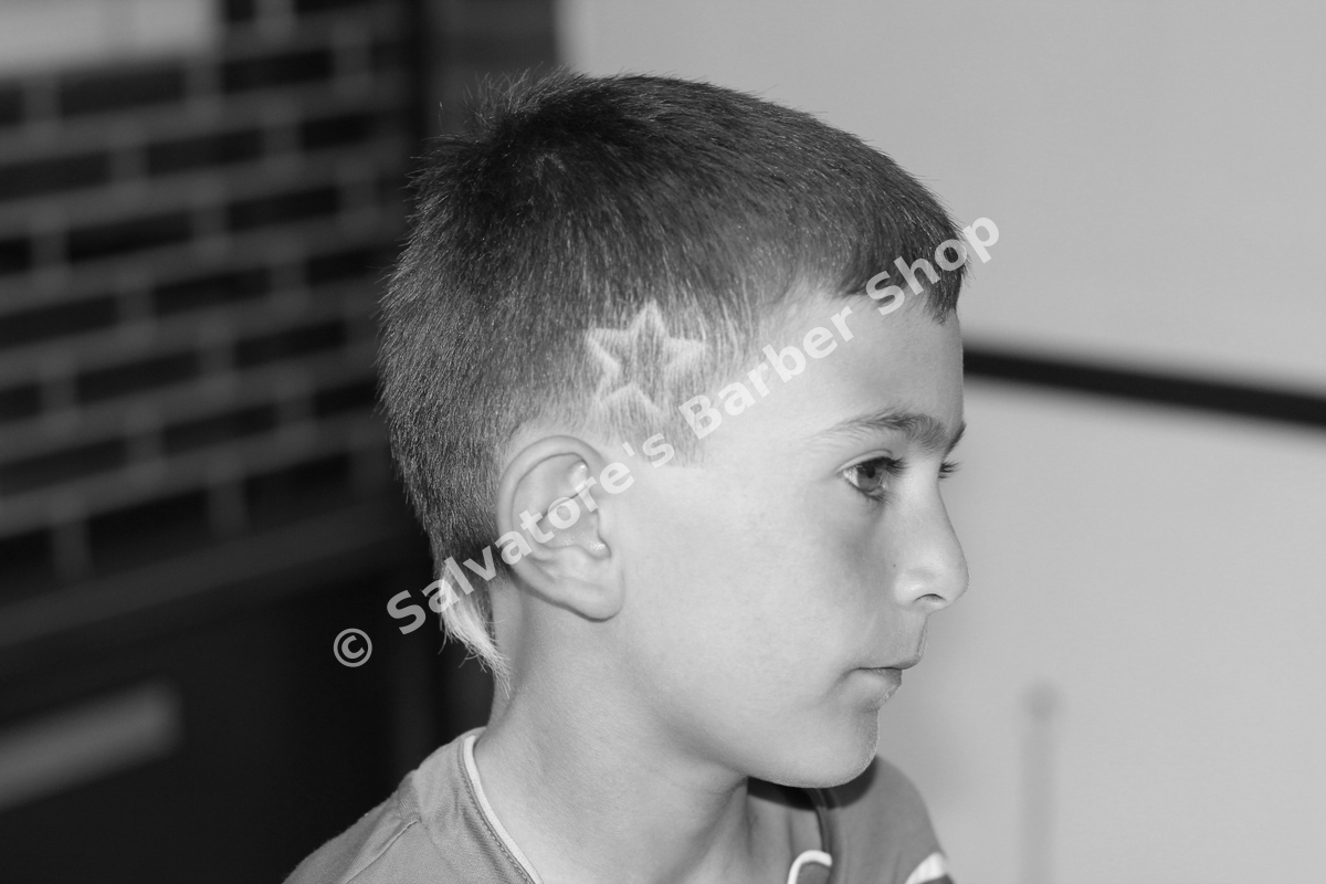 Children's haircut with star hair design by Salvatore's Barber Shop Bristol