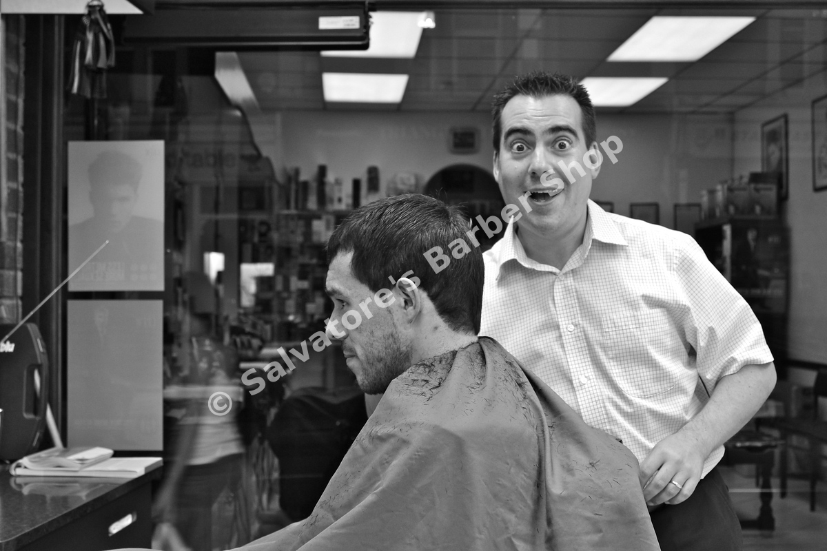 Salvatore with a customer at Salvatore's Barber Shop Bristol