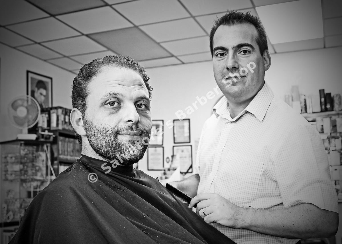 Salvatore with a customer at Salvatore's Barber Shop Bristol