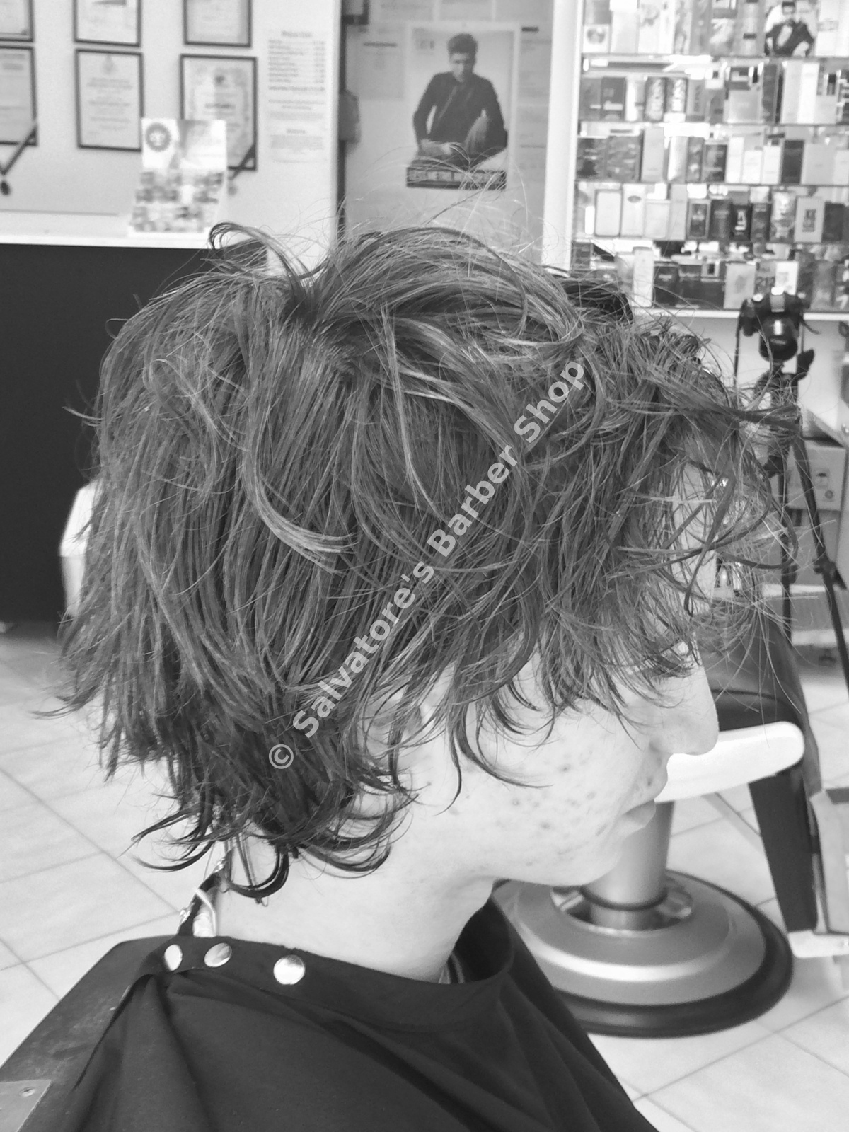 Long wavy hairstyle by Salvatore's Barber Shop Bristol