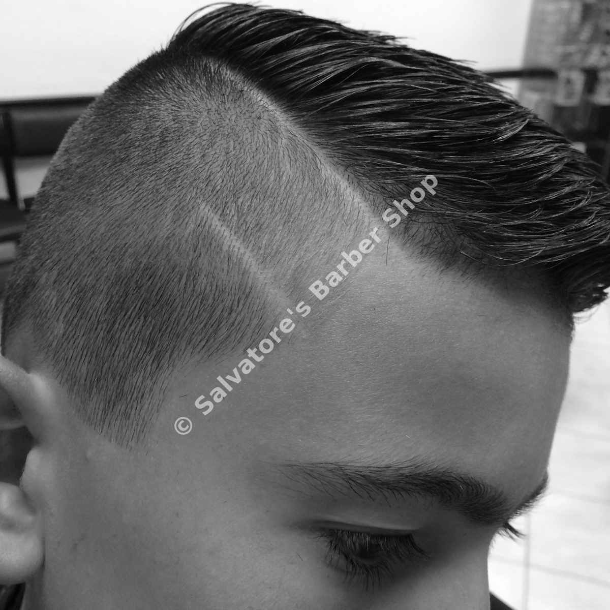 Quiff haircut with skin fade by Salvatore's Barber Shop Bristol