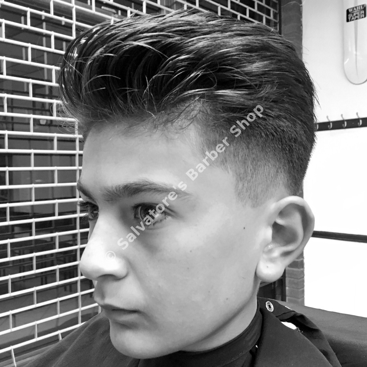 Quiff haircut with skin fade by Salvatore's Barber Shop Bristol