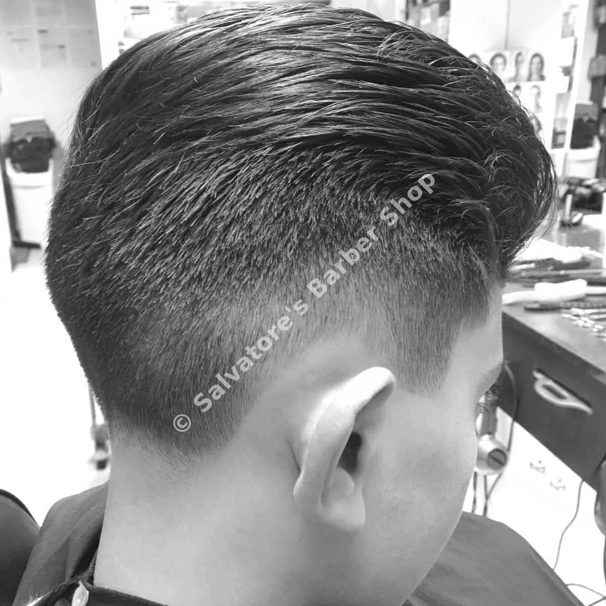 Quiff haircut with low fade by Salvatore's Barber Shop Bristol