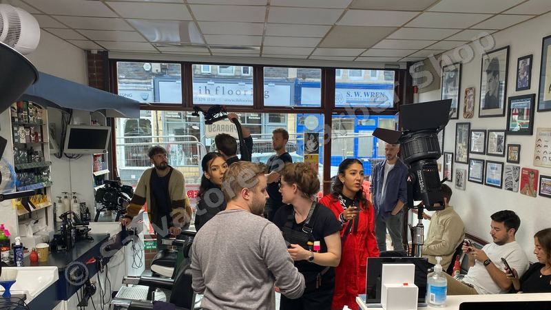 SPORTbible film crew inside Salvatore's Barber Shop