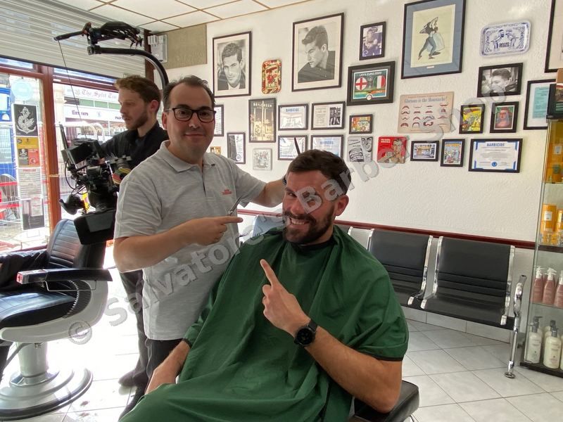 Salvatore cutting Ben Foster's hair on camera