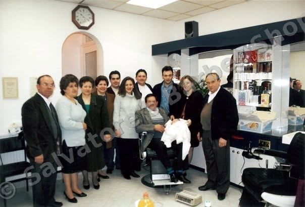 Family and friends celebrating the opening of Salvatore's Barber Shop 1994